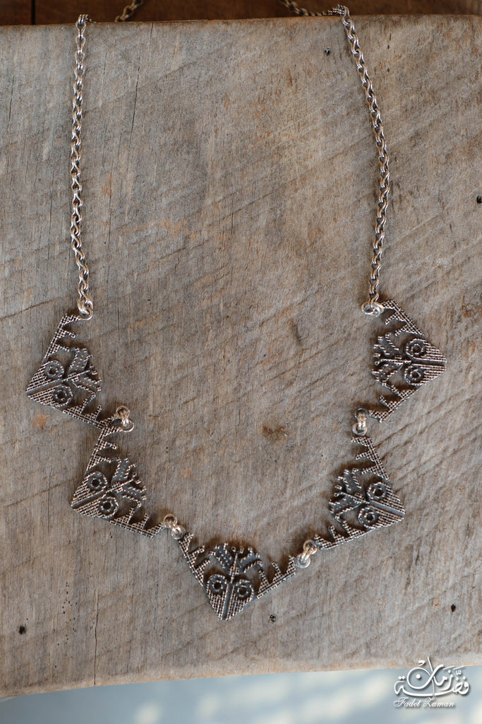 Amulet motifs necklace